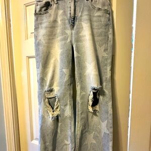 Risen crop jeans with star pattern. since loosing weight can’t wear.